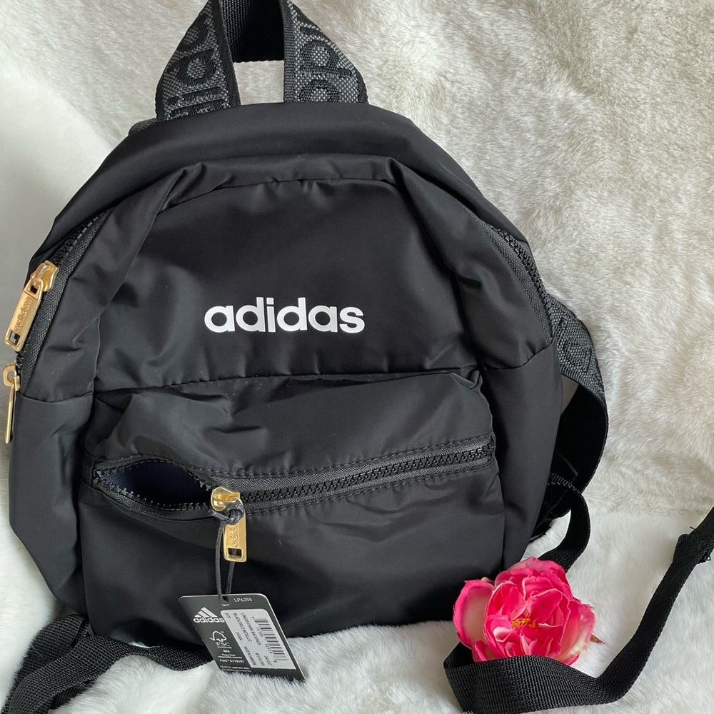 New with tags ADIDAS LINEAR 11 MINI BACKPACK BLK/Gold/Metallic Front zippered
